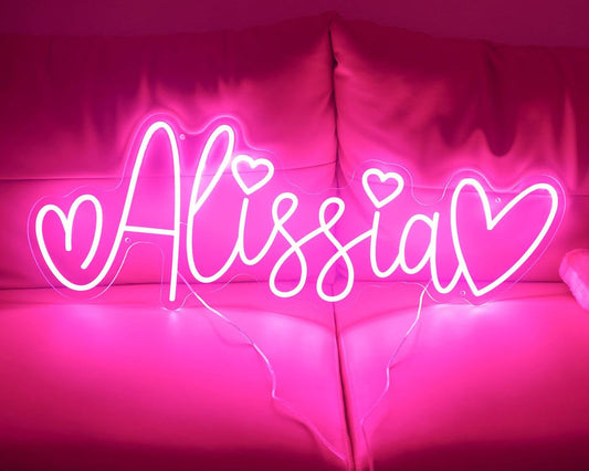ALISSIA LED Neon Name Sign by Neon.Shop adding vibrant LED glow to bedrooms, home offices, and living spaces.