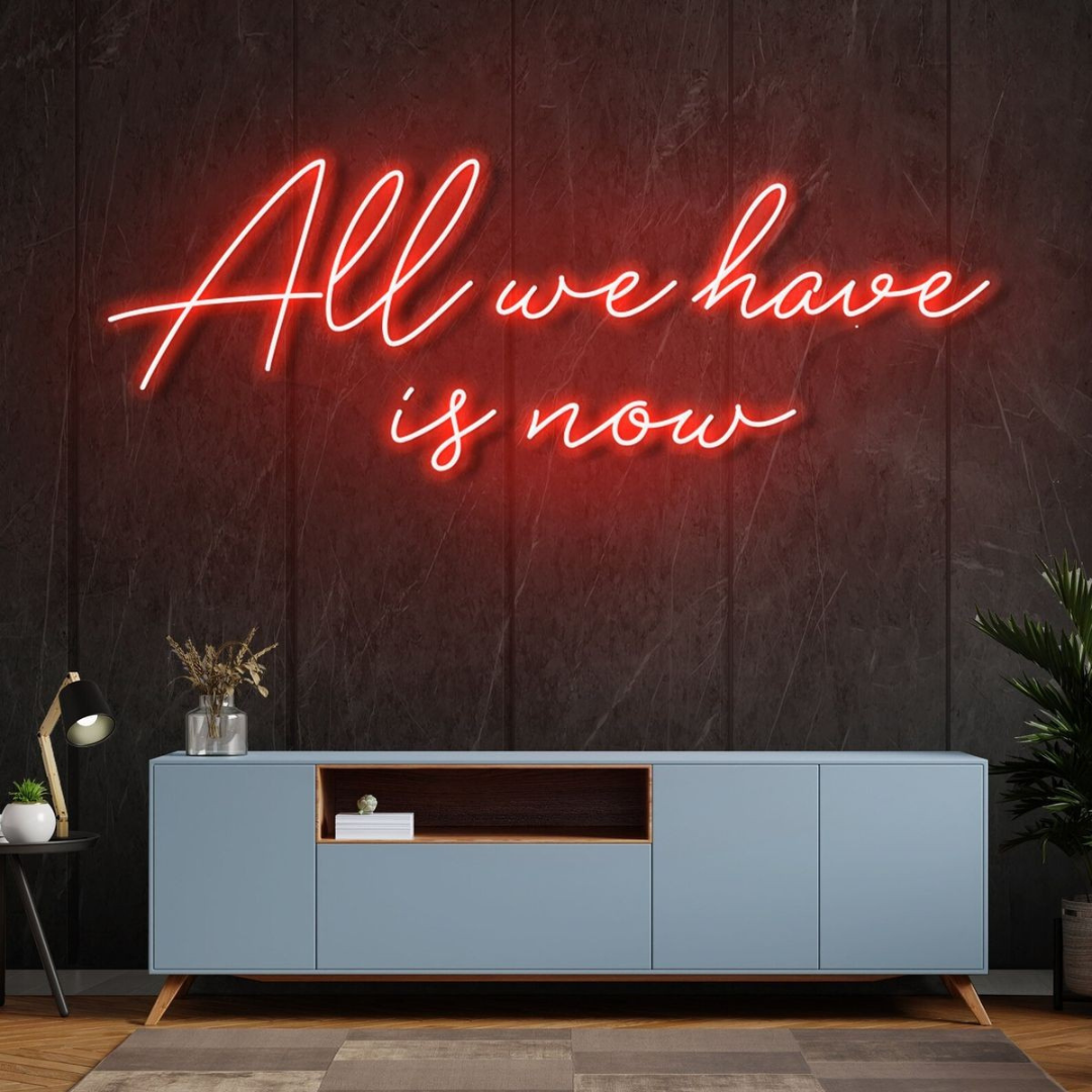 All We Have Is Now LED neon sign by Neon.Shop glowing on a modern wall as inspirational neon wall decor