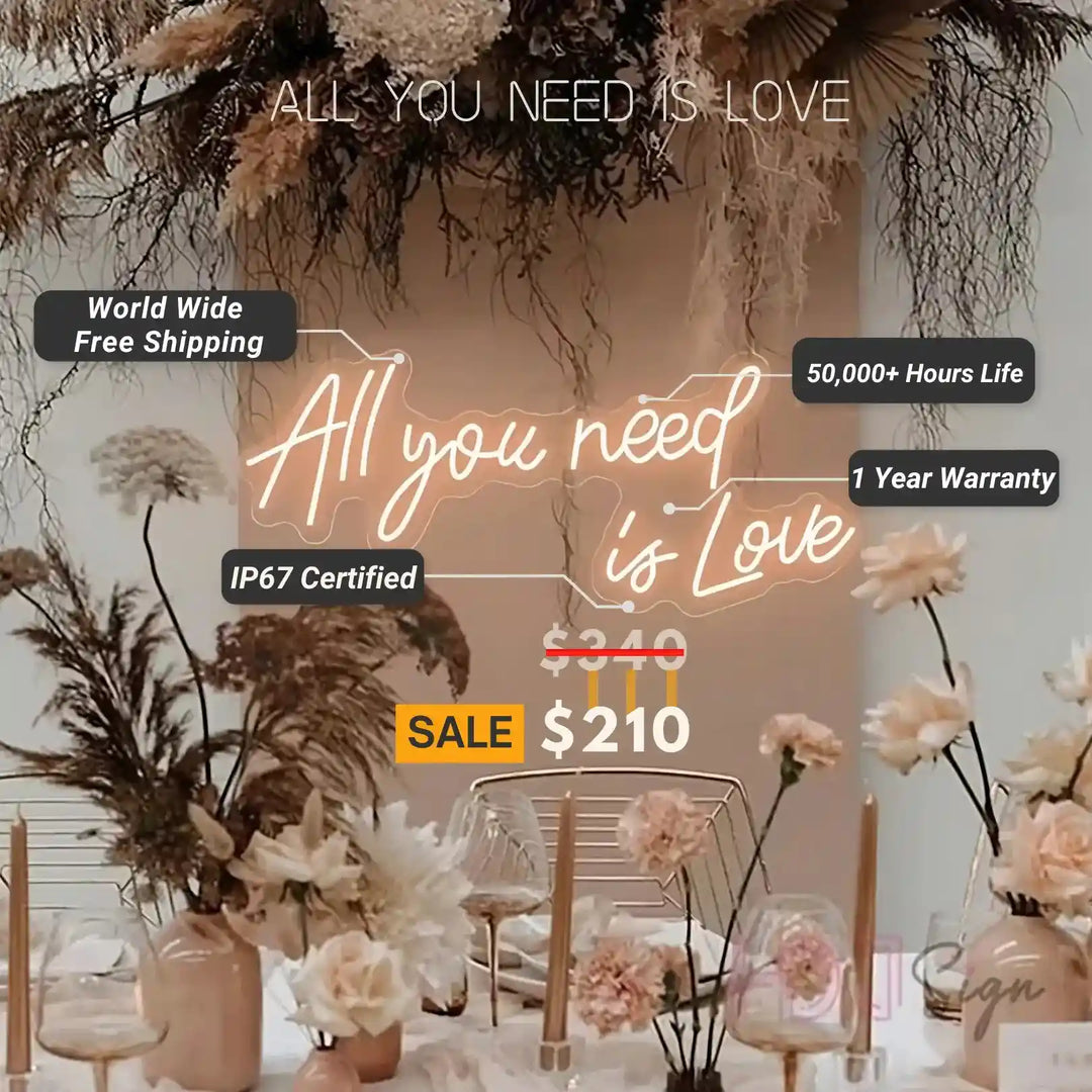 All You Need Is Love Wedding Neon Sign by Neon.Shop glowing in warm LED light on a wedding décor backdrop”