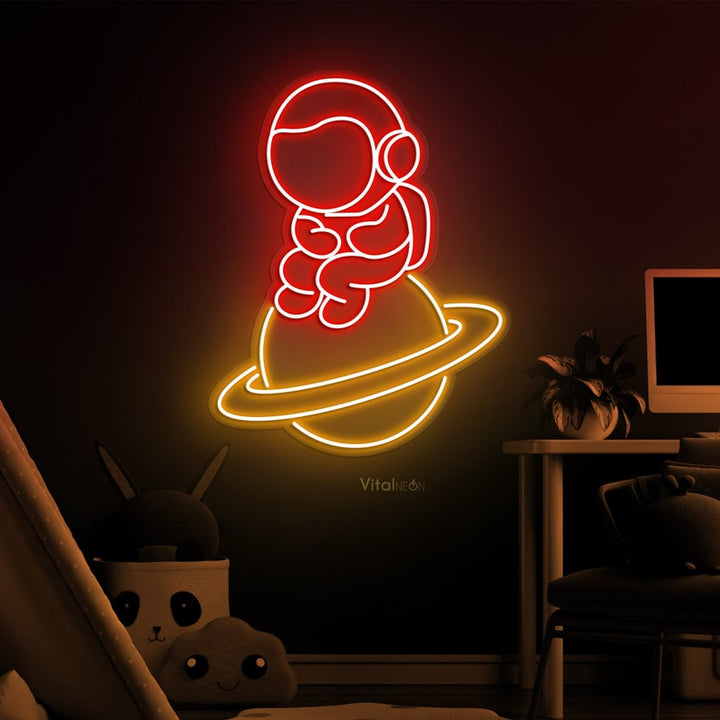Baby Astronaut UV Art LED neon sign glowing on bedroom wall by Neon.Shop