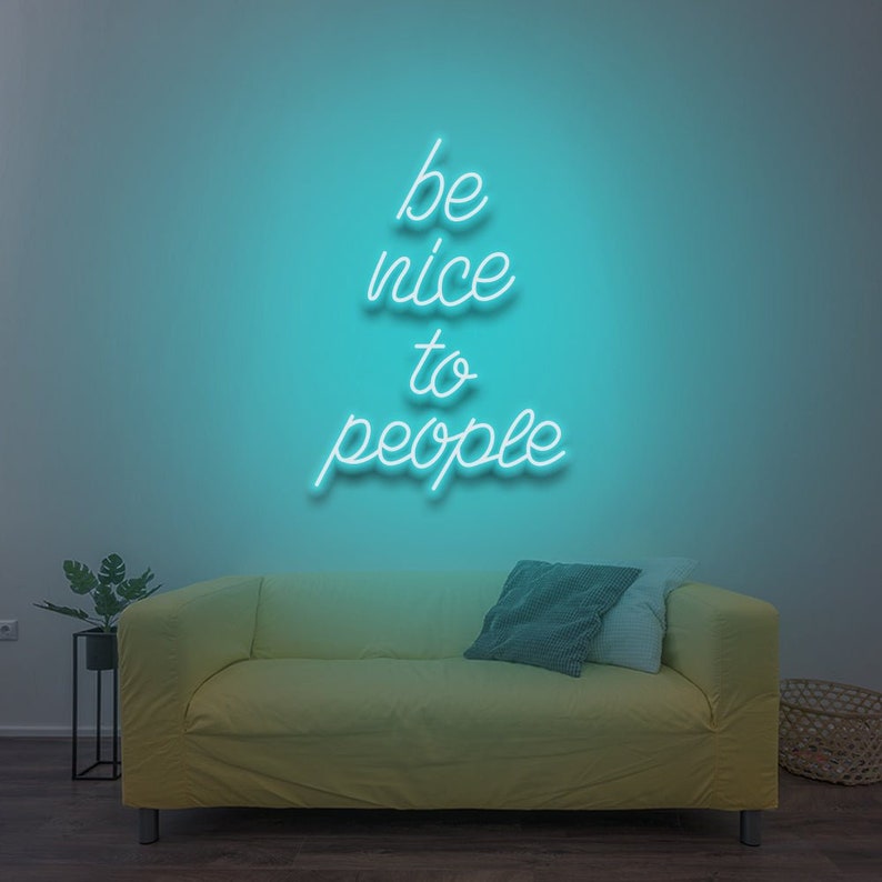 Be Nice To People” inspirational LED neon wall light, perfect for bedrooms, offices, or creative workspaces by Neon.Shop.