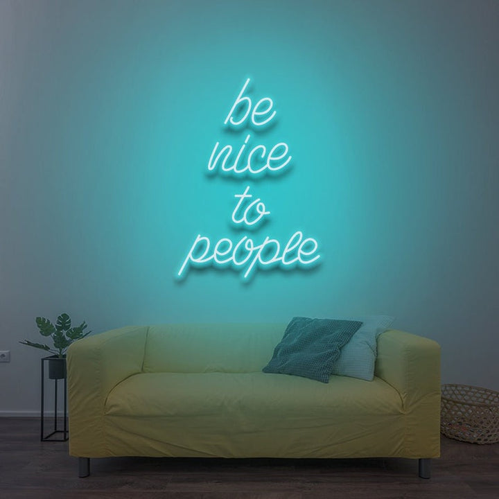 Be Nice To People” inspirational LED neon wall light, perfect for bedrooms, offices, or creative workspaces by Neon.Shop.