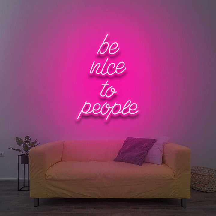 Be Nice To People” inspirational LED neon wall light, perfect for bedrooms, offices, or creative workspaces by Neon.Shop.