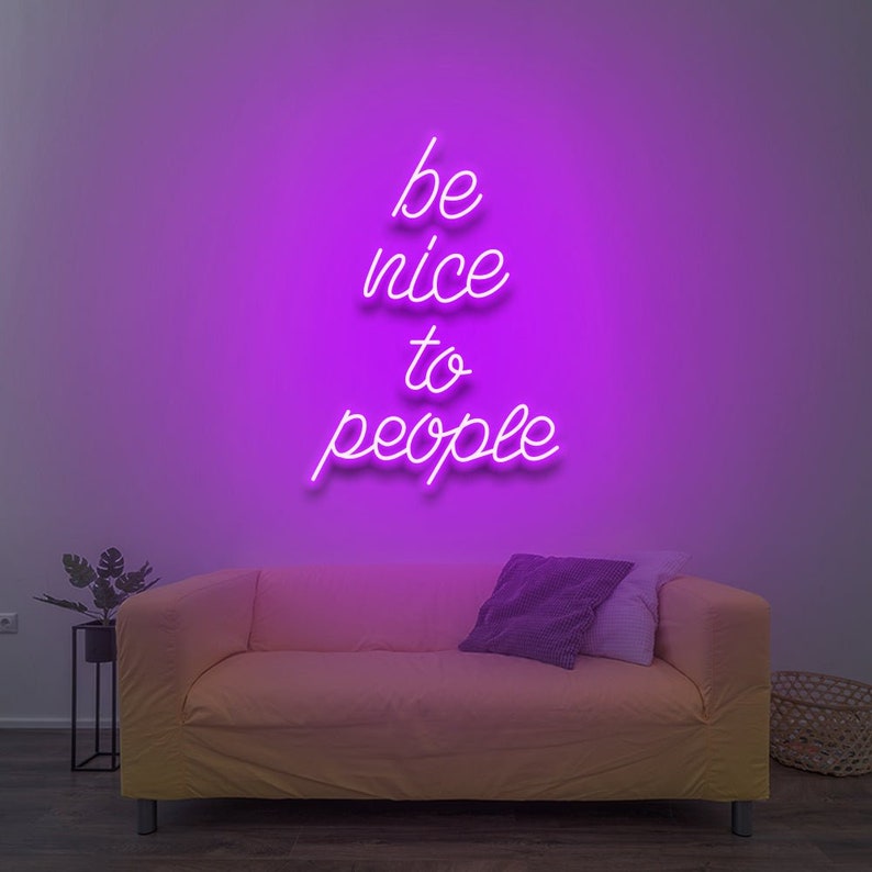 Be Nice To People” inspirational LED neon wall light, perfect for bedrooms, offices, or creative workspaces by Neon.Shop.