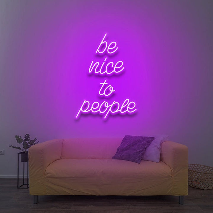 Be Nice To People” inspirational LED neon wall light, perfect for bedrooms, offices, or creative workspaces by Neon.Shop.