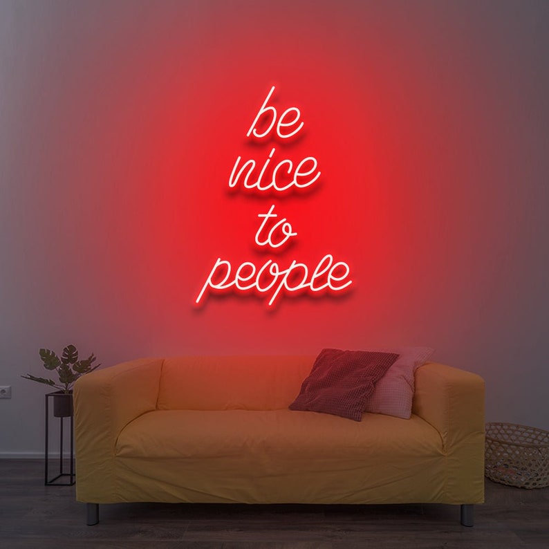 Be Nice To People” inspirational LED neon wall light, perfect for bedrooms, offices, or creative workspaces by Neon.Shop.