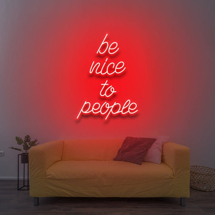 Be Nice To People” inspirational LED neon wall light, perfect for bedrooms, offices, or creative workspaces by Neon.Shop.