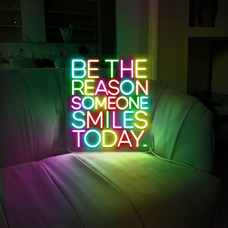 Be The Reason Someone Smiles Today neon sign glowing in bright LED colors by Neon.Shop