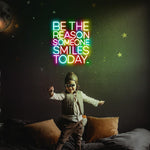 Be The Reason Someone Smiles Today neon sign glowing in bright LED colors by Neon.Shop