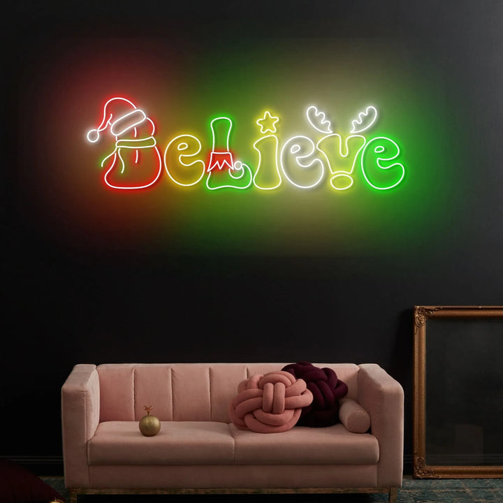 Believe Merry Christmas Neon Sign by Neon.Shop featuring glowing festive script for holiday décor.