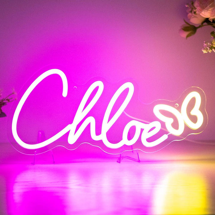 CHLOE LED Neon Name Sign by Neon.Shop adding vibrant LED glow to bedrooms, home offices, and living spaces.