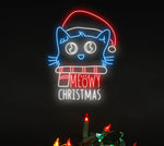 Cat Meowy Merry Christmas LED neon sign glowing in festive colors by Neon.Shop.
