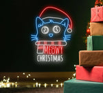 Cat Meowy Merry Christmas LED neon sign glowing in festive colors by Neon.Shop.