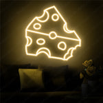 Cheese LED neon sign by Neon.Shop glowing on a wall as fun food-themed neon décor