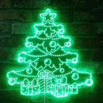 Christmas Tree Gifts Merry Christmas Neon Sign by Neon.Shop with glowing tree, gifts, and lettering on festive backdrop.