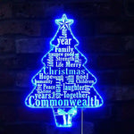 Christmas Tree Wishes Merry Christmas Neon Sign by Neon.Shop glowing with tree and festive lettering on holiday backdrop.