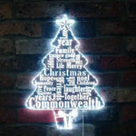 Christmas Tree Wishes Merry Christmas Neon Sign by Neon.Shop glowing with tree and festive lettering on holiday backdrop.