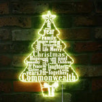 Christmas Tree Wishes Merry Christmas Neon Sign by Neon.Shop glowing with tree and festive lettering on holiday backdrop.