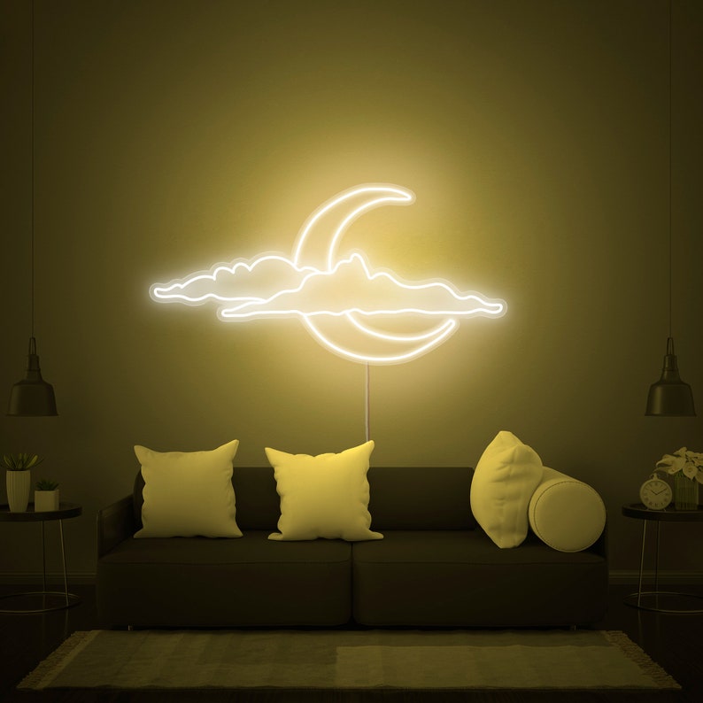 Cloud and Moon LED neon sign by Neon.Shop glowing on a wall as soft and dreamy celestial décor