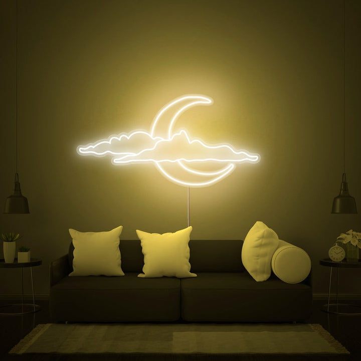 Cloud and Moon LED neon sign by Neon.Shop glowing on a wall as soft and dreamy celestial décor