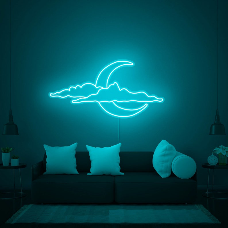 Cloud and Moon LED neon sign by Neon.Shop glowing on a wall as soft and dreamy celestial décor