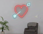 Cupid Heart Love LED neon wall sign by Neon.Shop glowing beautifully in a stylish interior, expressing love, passion, and emotional connection your space.