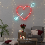 Cupid Heart Love LED neon wall sign by Neon.Shop glowing beautifully in a stylish interior, expressing love, passion, and emotional connection your space.