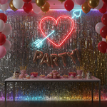 Cupid Heart Love LED neon wall sign by Neon.Shop glowing beautifully in a stylish interior, expressing love, passion, and emotional connection