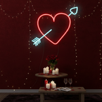 Cupid Heart Love LED neon wall sign by Neon.Shop glowing beautifully in a stylish interior, expressing love, passion, and emotional connection your space.