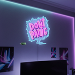 Don’t Panic UV Art LED Neon Sign glowing with vibrant UV art, playful and calming LED wall décor by Neon.Shop