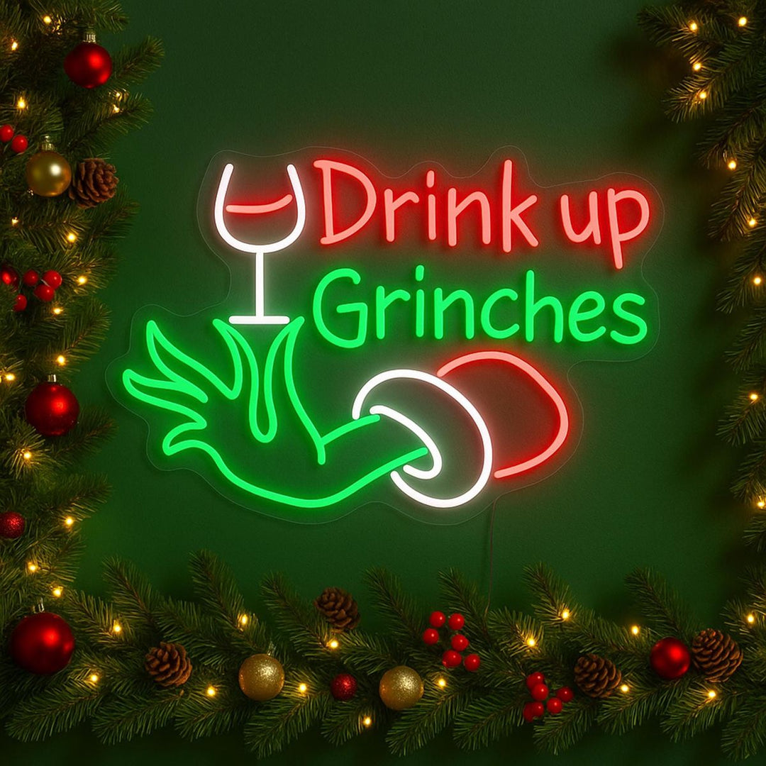 Drink Up Merry Christmas LED neon sign glowing in festive colors by Neon.Shop.