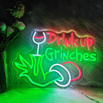 Drink Up Merry Christmas LED neon sign glowing in festive colors by Neon.Shop.