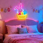 Easter Egg Basket LED neon sign glowing on wall with colorful basket filled with Easter eggs for home decor, party, or shop display by Neon.Shop.
