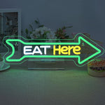 Eat Here LED neon sign by Neon.Shop mounted outside a restaurant to attract foot traffic