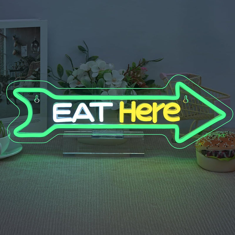 Eat Here LED neon sign by Neon.Shop mounted outside a restaurant to attract foot traffic