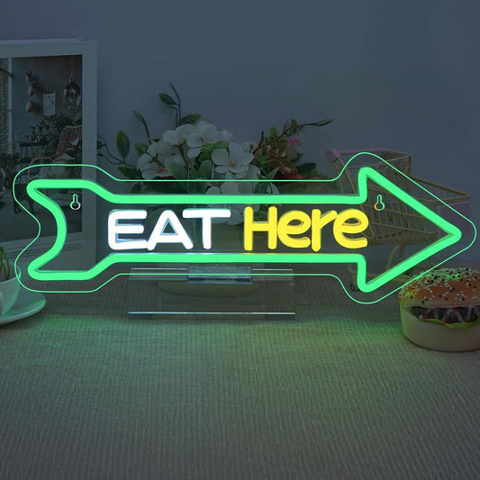 Eat Here LED neon sign by Neon.Shop mounted outside a restaurant to attract foot traffic