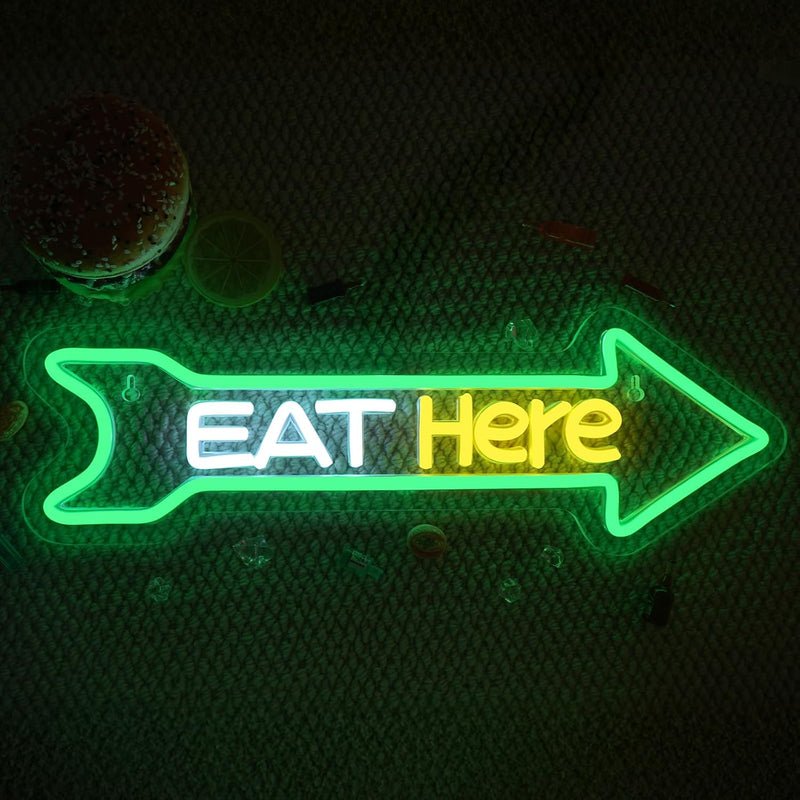 Eat Here LED neon sign by Neon.Shop mounted outside a restaurant to attract foot traffic