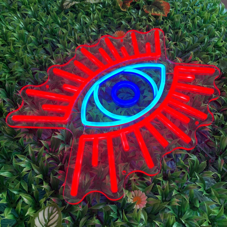 Evil Eye LED neon sign by Neon.Shop glowing on a wall as modern, protective, and stylish neon décor