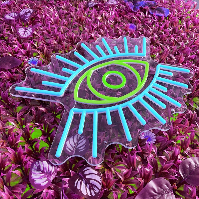 Evil Eye LED neon sign by Neon.Shop glowing on a wall as modern, protective, and stylish neon décor