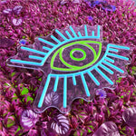 Evil Eye LED neon sign by Neon.Shop glowing on a wall as modern, protective, and stylish neon décor
