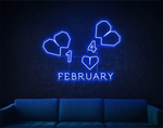 February” Valentine’s Day LED neon sign glowing in warm pink and red tones, perfect for love-themed décor by Neon.Shop