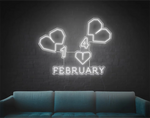 February” Valentine’s Day LED neon sign glowing in warm pink and red tones, perfect for love-themed décor by Neon.Shop