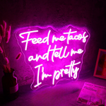 Feed Me Tacos And Tell Me I Am Pretty LED neon sign glowing brightly, perfect for kitchens, dining areas, and playful home décor by Neon.Shop