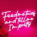Feed Me Tacos And Tell Me I Am Pretty LED neon sign glowing brightly, perfect for kitchens, dining areas, and playful home décor by Neon.Shop