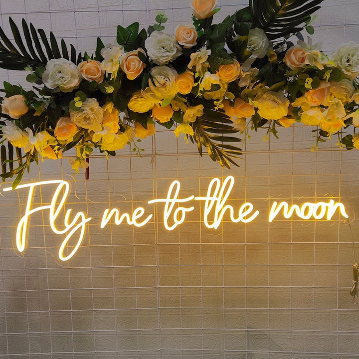 Fly Me to the Moon wedding LED neon sign glowing on backdrop – Neon.Shop