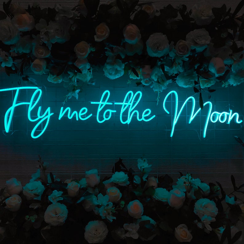 Fly Me to the Moon wedding LED neon sign glowing on backdrop – Neon.Shop