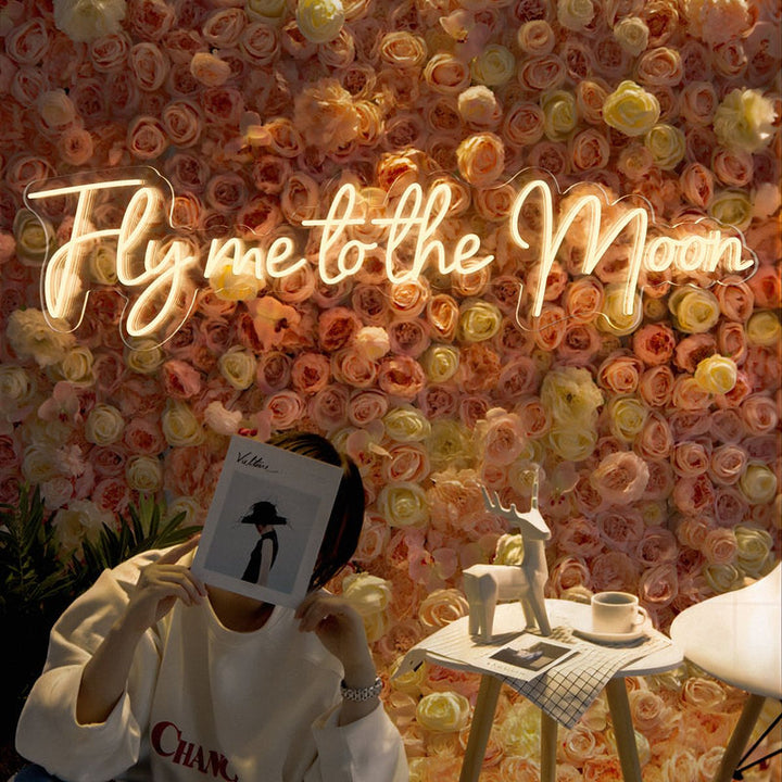 Fly Me to the Moon wedding LED neon sign glowing on backdrop – Neon.Shop