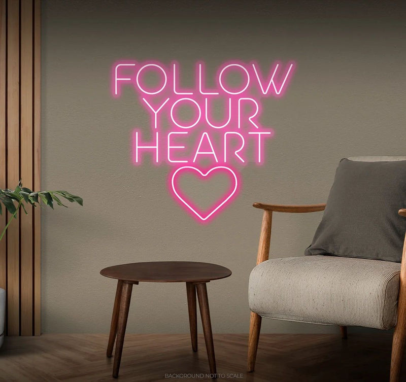Follow Your Heart” neon sign glowing on a wall, motivational quote décor for bedroom or office by Neon.Shop.
