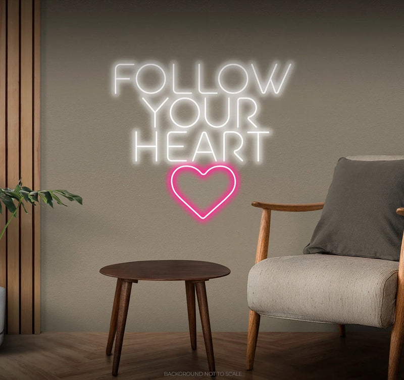 Follow Your Heart” neon sign glowing on a wall, motivational quote décor for bedroom or office by Neon.Shop.
