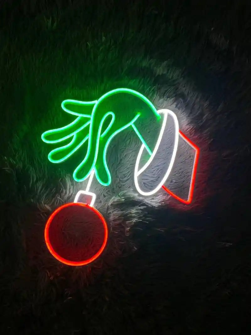 The Grinch Stealing Christmas Neon Sign by Neon.Shop featuring glowing Grinch design and festive colors for holiday décor.